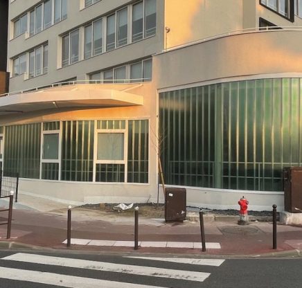 Rénovation thermique du siège Emmaüs Habitat – Façade arrondie en Profilit