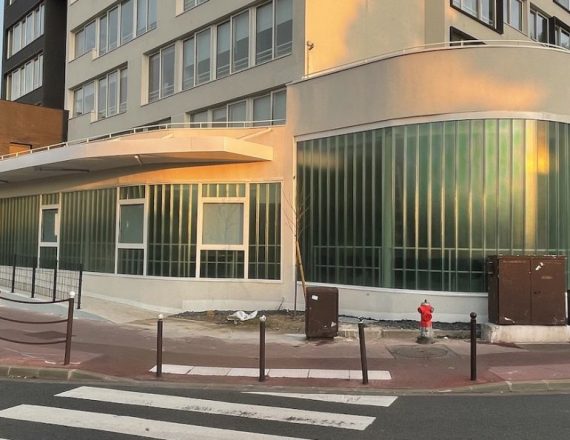 Rénovation thermique du siège Emmaüs Habitat – Façade arrondie en Profilit